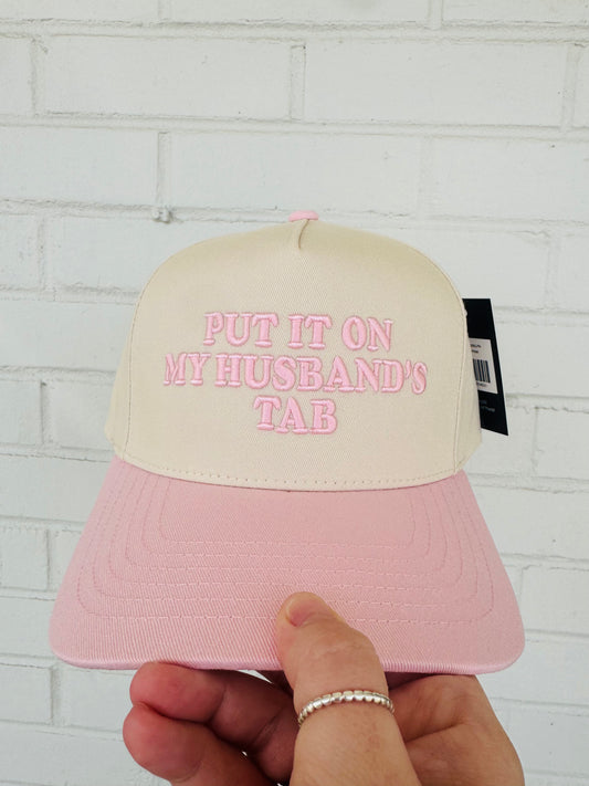 PUT IT ON MY HUSBAND'S TAB Trucker Hat